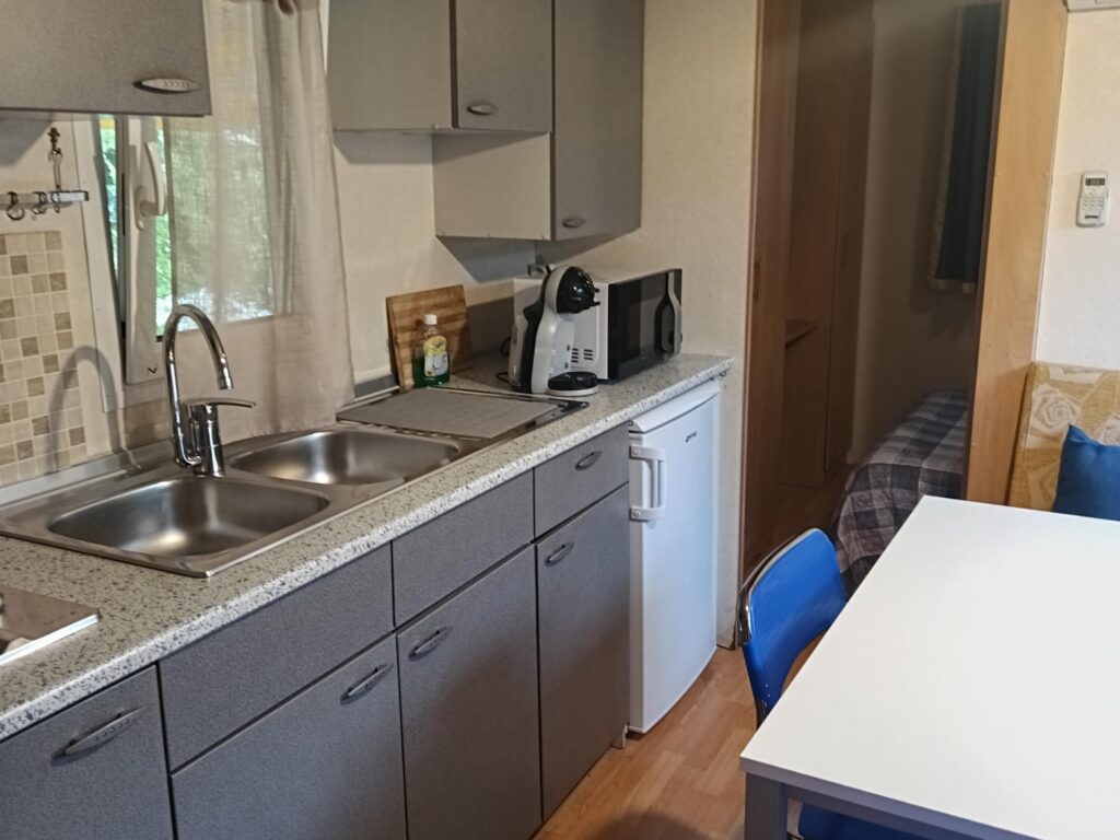Zona giorno con cucina attrezzata della Casa Mobile Garden